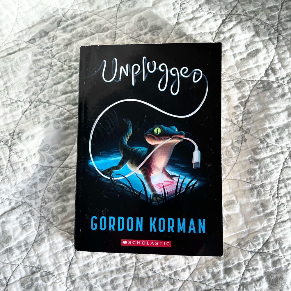 OS Unplugged by Gordon Korman Scholastic Paperback Book